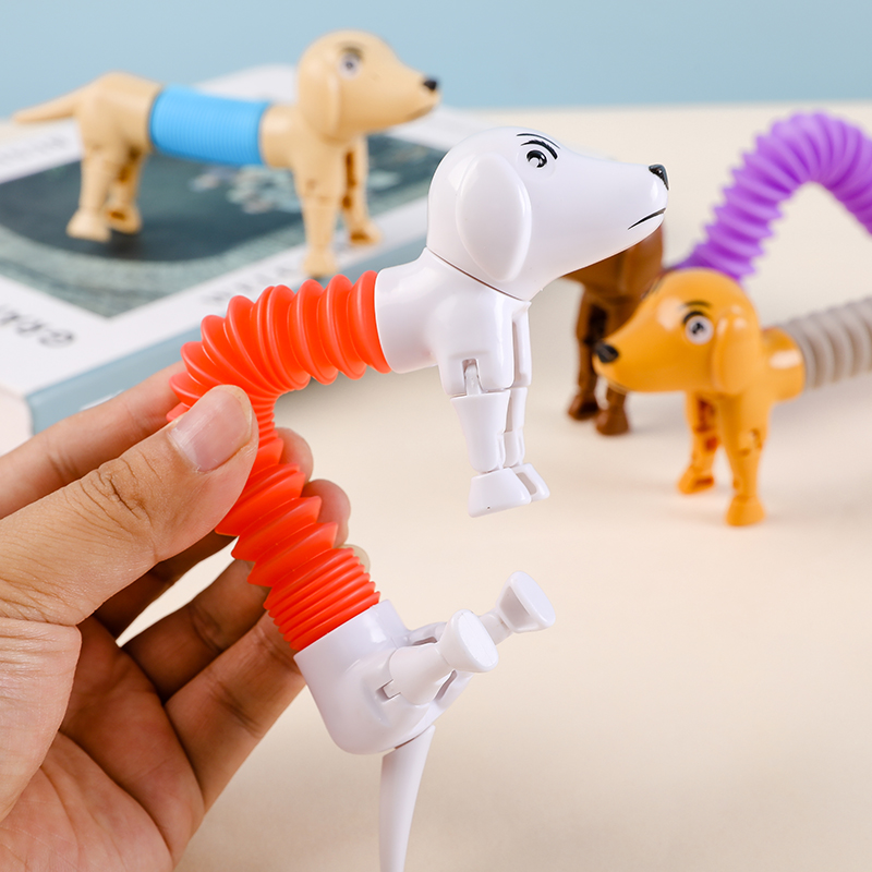 Novelty Spring Dog Pop Tubes S - огляд і ціна Kids Toys Dog