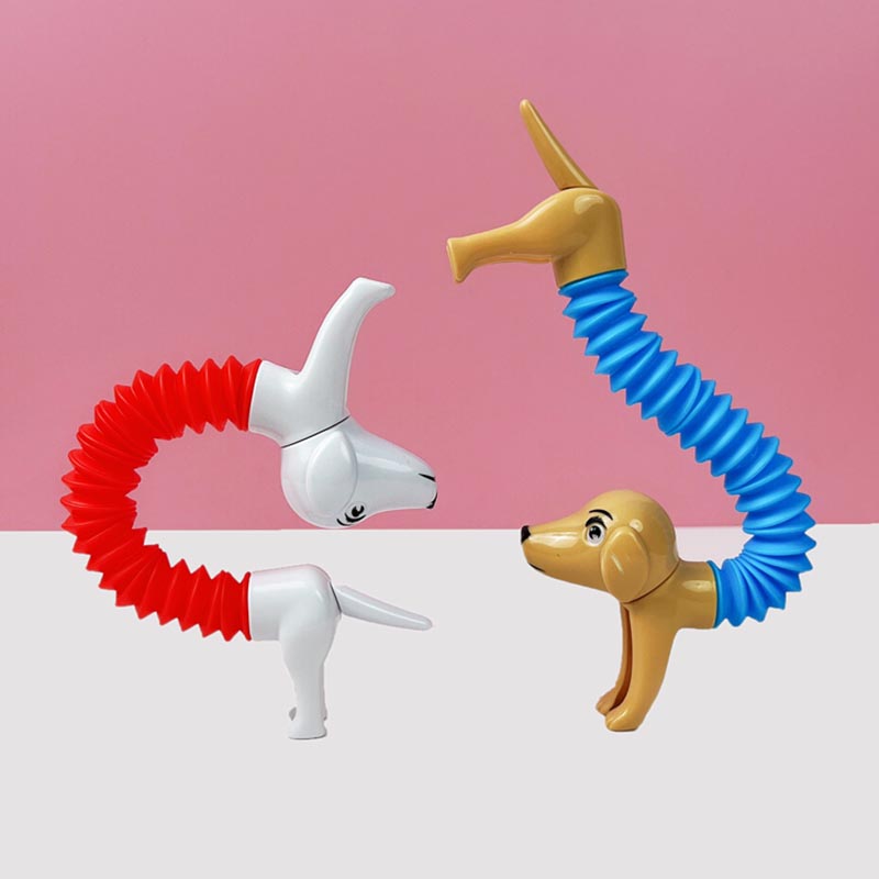 Novelty Spring Dog Pop Tubes S - огляд і ціна Kids Toys Dog