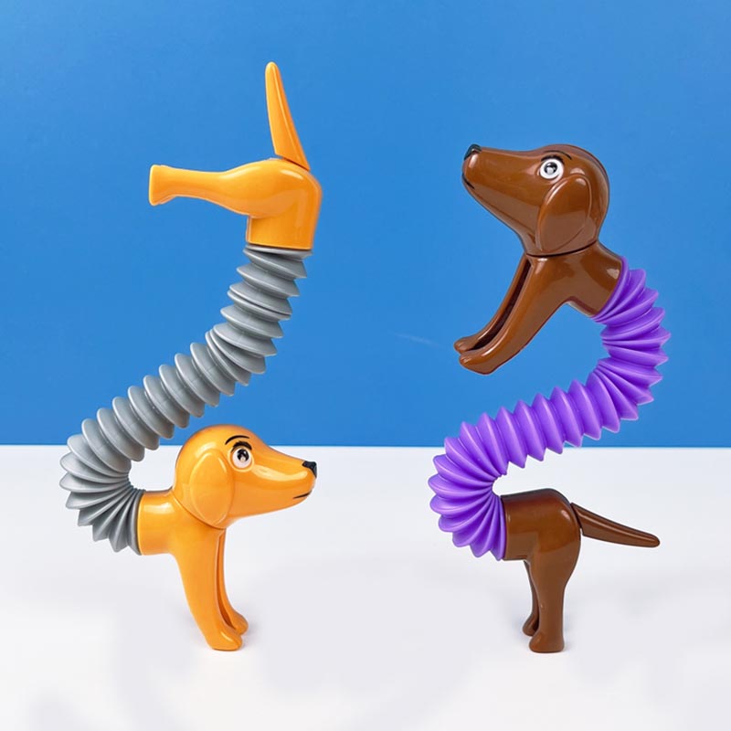 Novelty Spring Dog Pop Tubes S - огляд і ціна Kids Toys Dog