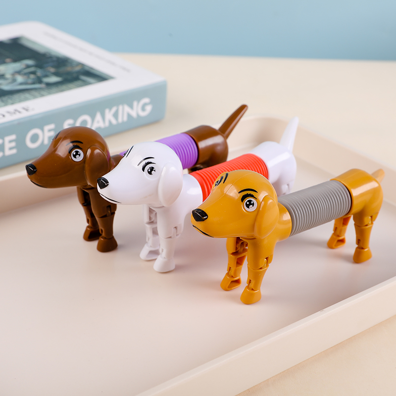 Novelty Spring Dog Pop Tubes S - огляд і ціна Kids Toys Dog